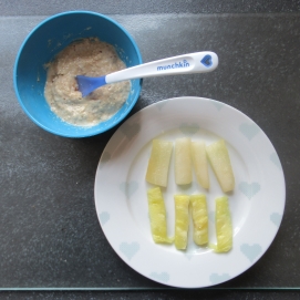 Jasper's breakfast - porridge with melon and pinapple.